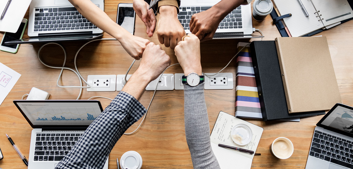 colleagues-giving-fist-bump